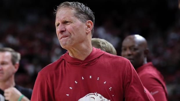 Razorbacks coach Eric Musselman on sideline against UNC-Wilmington